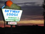 Sunset on Skyway sign